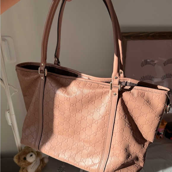 Gucci Handbags - Gucci Pink Embossed GG Leather Tote